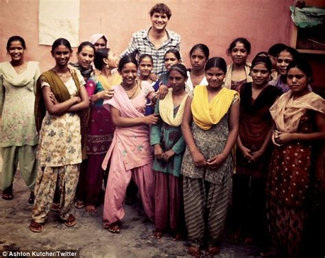 ashton kutcher towers over group in india daily mail online
