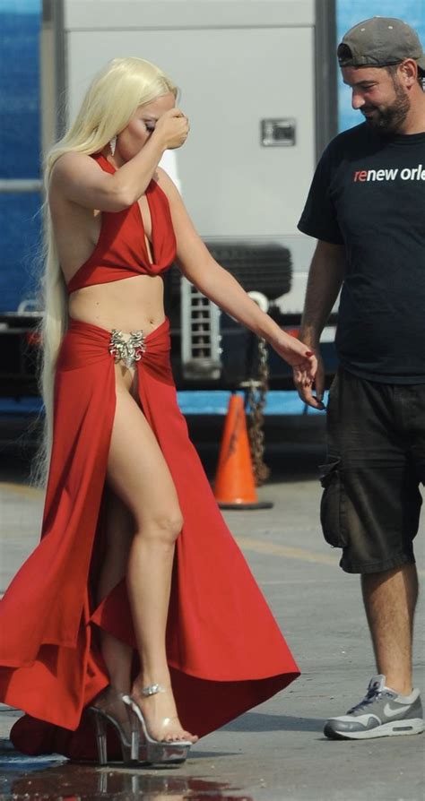 lady gaga flashes her nude panties in daring red gown