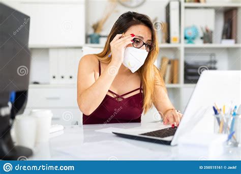 latina woman in face mask working at office stock image image of