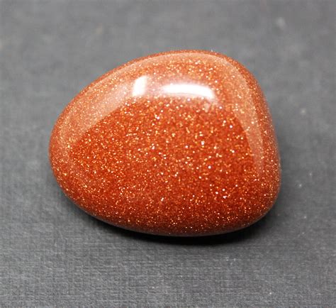 red goldstone tumbled stones choose  oz  oz   lb bulk lots  grade tumbled red