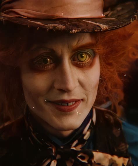 A Close Up Of A Person Wearing A Top Hat And Tie With Big Yellow Eyes