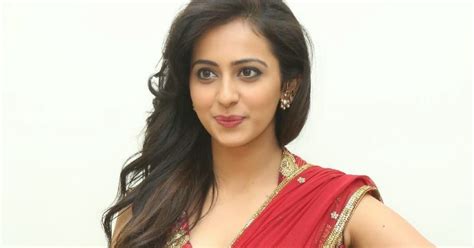 high quality bollywood celebrity pictures rakul preet singh super sexy skin show in red saree