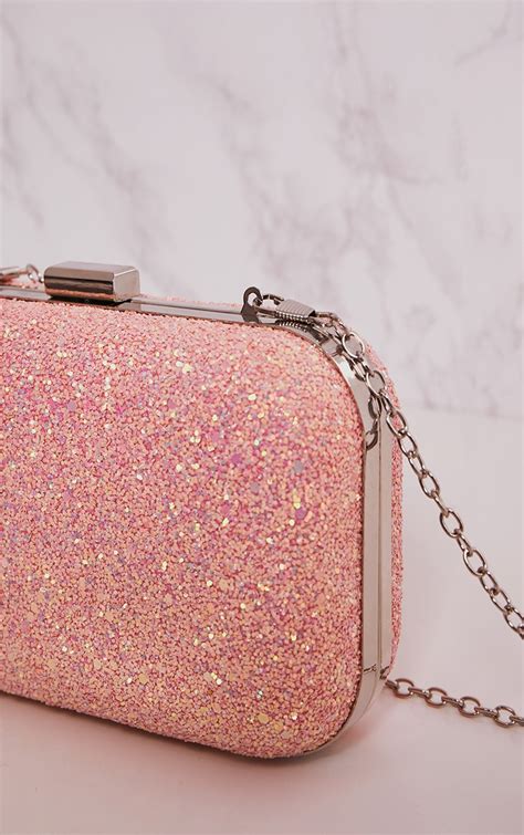 pink glitter metallic clutch bag prettylittlething