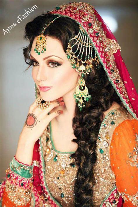 latest pakistan bridal jewellery design orange dress and red dopata