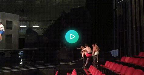 cirque du soleil tumbler performing a double layout split