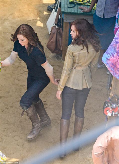 elizabeth olsen and chris evans on the set of captain america civil