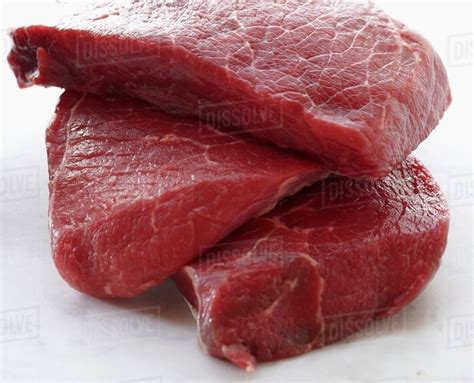 raw beef stacked stock photo dissolve