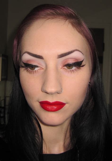 Glitter Is My Crack Thick Black Liner And Red Lips Makeup