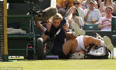 smash and volley one ballgirl provides landing mat for 6ft 3in tennis