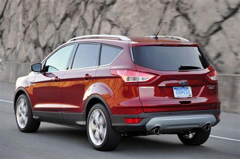 review  ford escape blends sporty character  utility  fast lane car