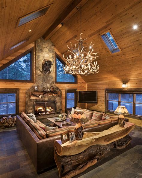 rustic cabin great room  stone fireplace hgtv