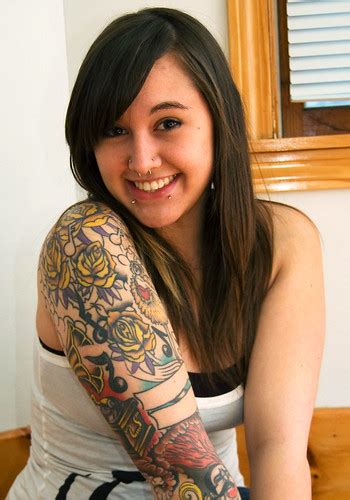 tattoo mania woman arm with tattoo art
