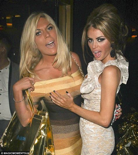 sexy babes chloe sims gives frankie essex a full on kiss at launch party