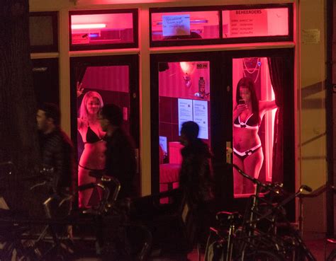 amsterdam s red light district places ban on tourists staring at sex workers