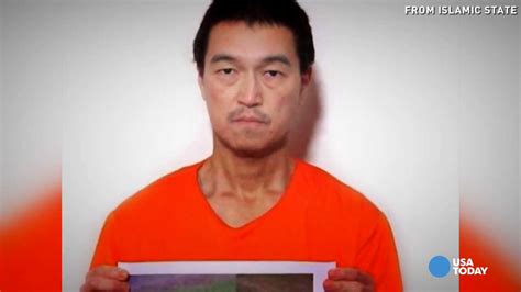 reports isil video claims japanese hostage beheaded