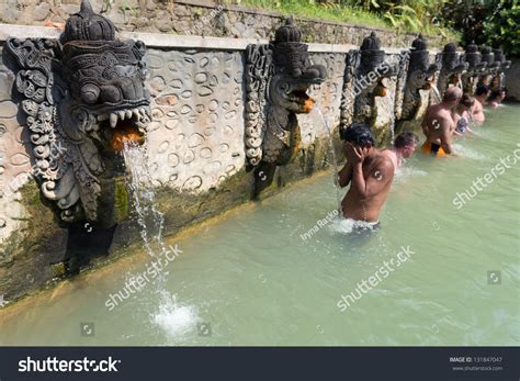 bali indonesia sep 20 people take a bath in termal