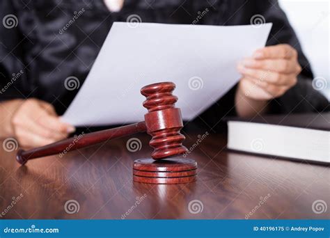 female judge reading verdict stock image image  agreement closeup