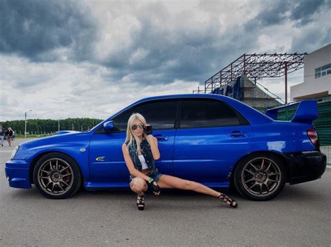 Here S Nothing But Hot Girls Posing With Awesome Cars Carbuzz