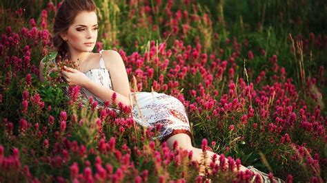 Download Lying Down Dress Brunette Field Flower Woman Mood Hd Wallpaper