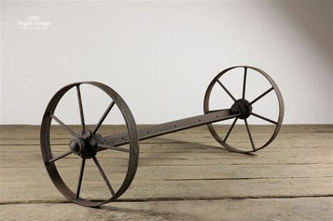 pair  rustic  cast iron wheels  axle