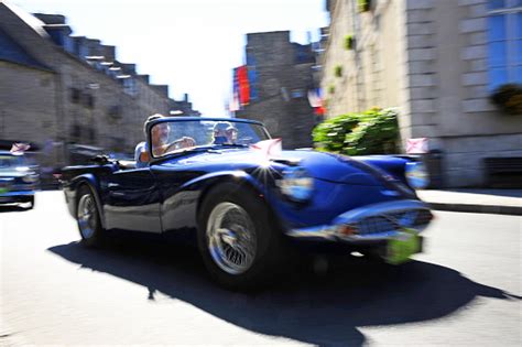 Vintage Car Rally Brittany France Mature Couple In A Blue Convertible