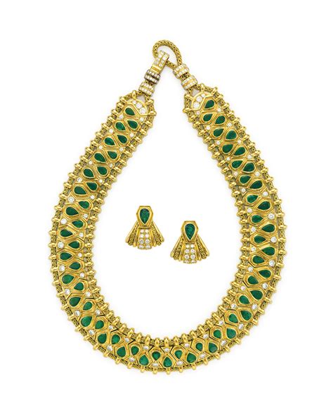 a set of hindu emerald diamond and gold jewelry by renÉ boivin