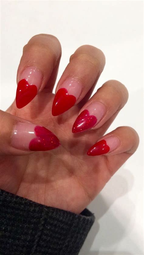 valentines day themed stiletto gel nails  red heart french tips gel nails glitter gel