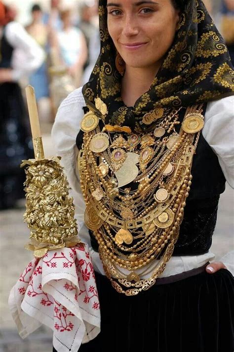 women wearing traditional northern portuguese clothing everything else is made of real gold