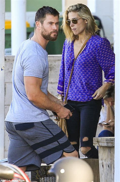 chris hemsworth displays bulging biceps while out with elsa pataky on