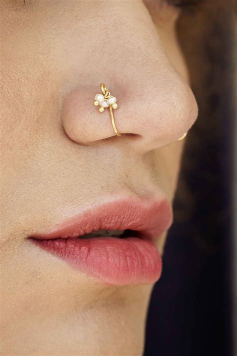 15 beautiful nose pins you can try that don t even require