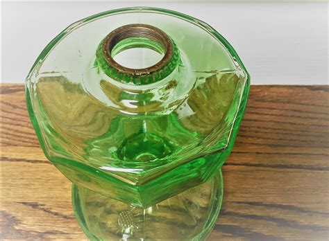 vintage uranium glass oil lamp base glowing green glass giant oil