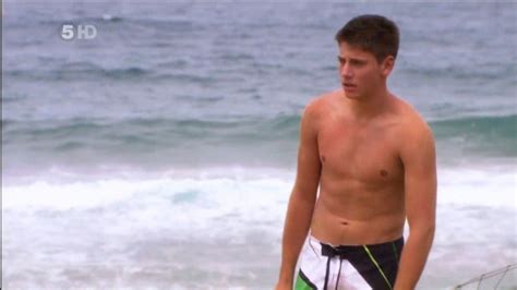 lincoln younes shirtless at the beach on home and away