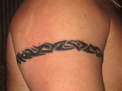 Small Tribal Arm Band On Shoulder Tattooimages