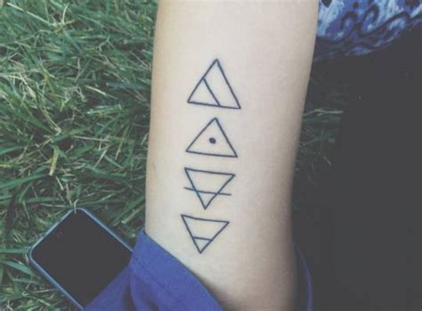 glyph tattoos    arm meaning explore