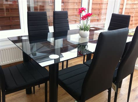 stunning black glass dining table set     black faux leather
