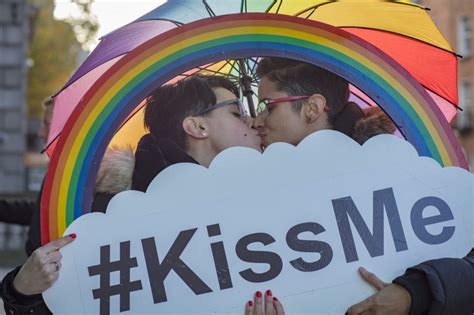 shift the hate away lgbt couples stage kissing protest outside dáil to