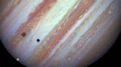 jupiters biggest moons started  tiny grains  hail   york times