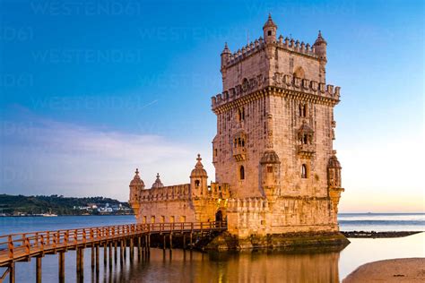portugal lisbon torre de belem  sunset stock photo