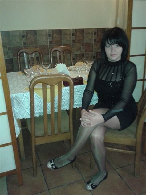 amateur pantyhose on twitter sitting at the table in shiny pantyhose