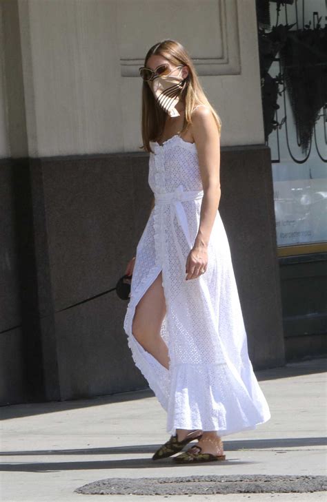 olivia palermo in a white dress was seen out in downtown