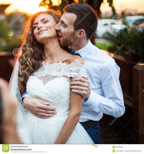 Romantic Valentynes Couple Of Newlyweds Hugging At Kissing
