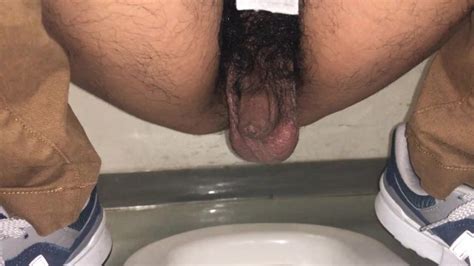 men s toilet photographing the phimosis penis in the pee