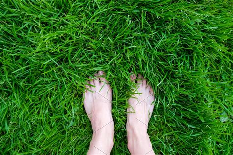 ad female feet on the grass barefoot by korneevakristina on