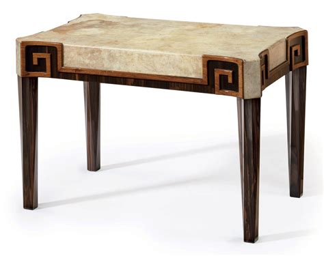 marcel coard    macassar ebony  parchment  table