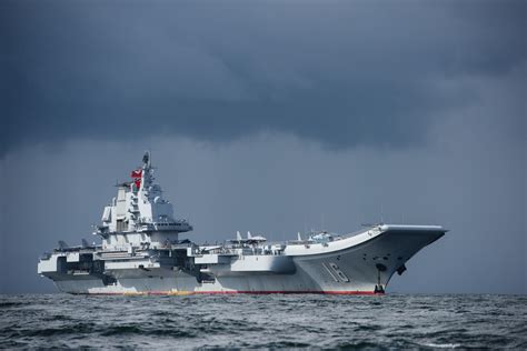 U S Navy Warship Shadows China Aircraft Carrier In Video