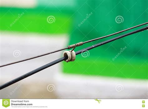 wire electric electricity current volt brown background stock photo image  grass