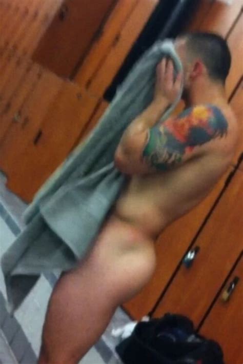 muscle tattoed hunk coming out the showers my own private locker room