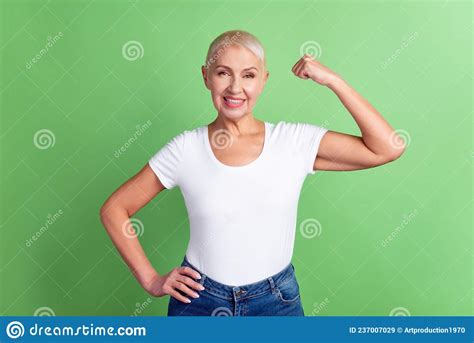Photo Of Cheerful Mature Woman Show Arm Muscles Sportive Exercise
