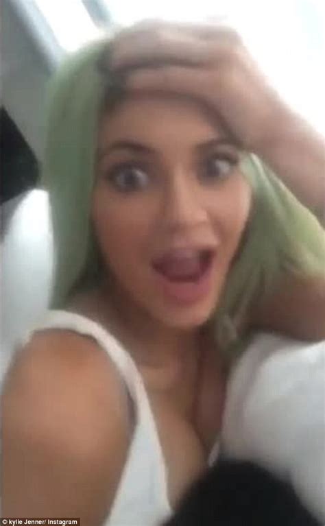 kylie jenner allows tyga to lean on her cleavage in racy snapchat video daily mail online