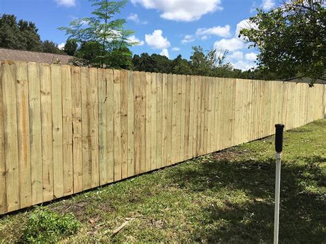 stockade wood fence  superior fence rail